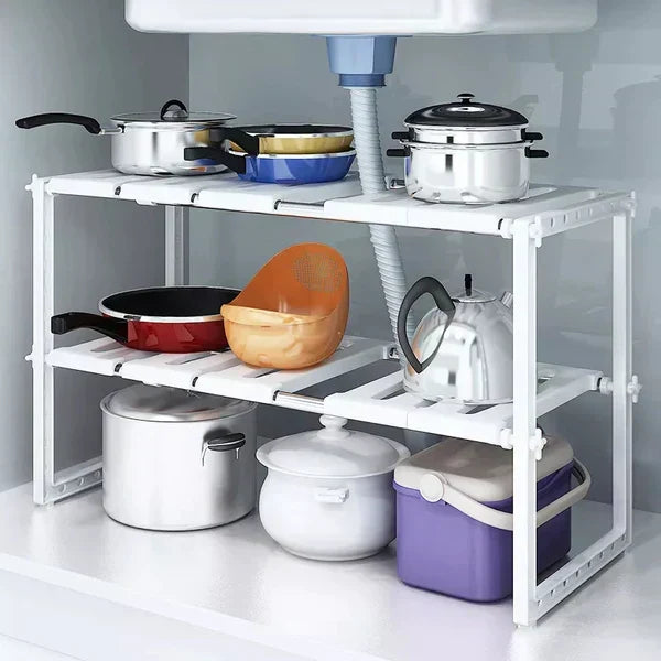 Adjustable under sink storage shelf