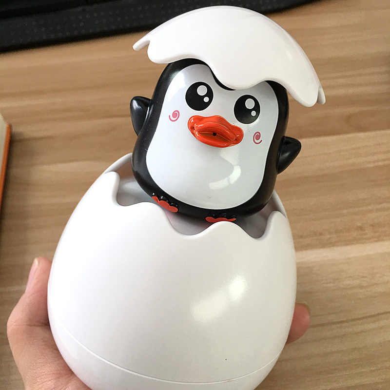 Cute Water Spray Duck Eggs Bath Toy Magic Hatching Growing Duck