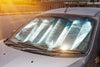 Windshield retractable sun shade