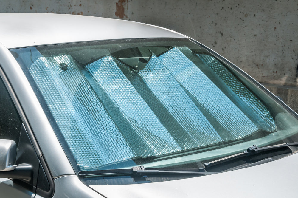 Windshield retractable sun shade
